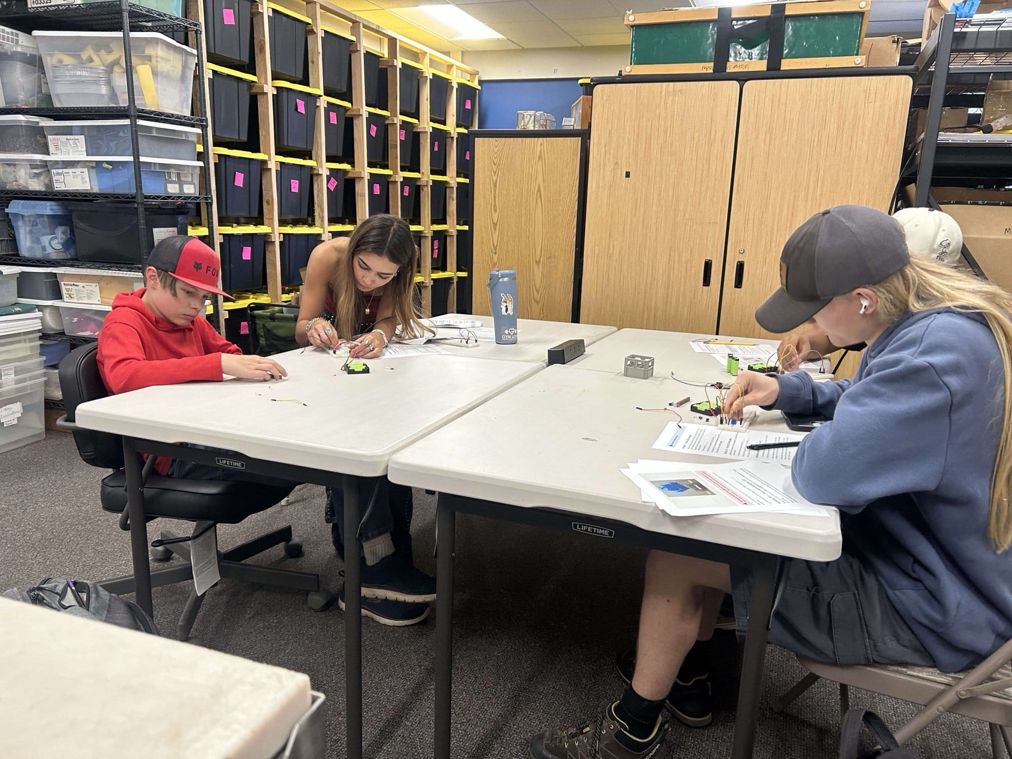 Students wiring circuits on breadboards