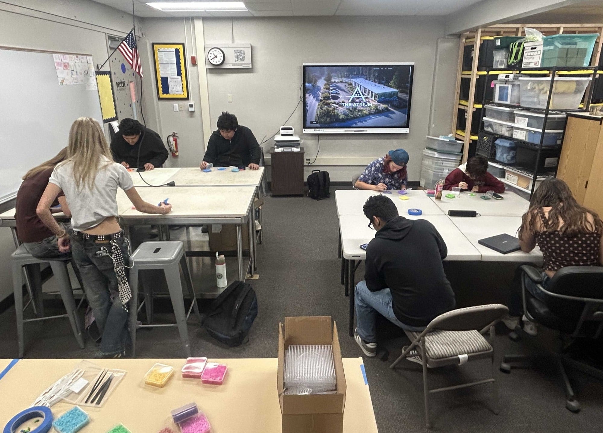 Students at the Makerspace FLEX period working at tables